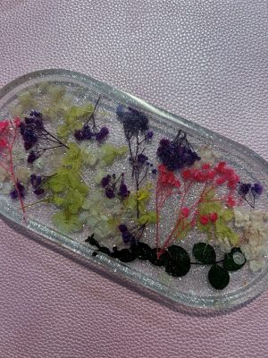 9"x 4.5" Clear acrylic trinket tray with purple, pink, yellow and white dried flowers and glitter