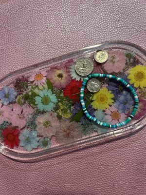 9"x 4.5" Clear acrylic trinket tray with purple, pink, yellow and white dried flowers and glitter