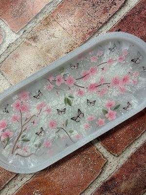 9.25" x 4.50" Clear oval trinket tray with gold glitter and embedded gold crosses
